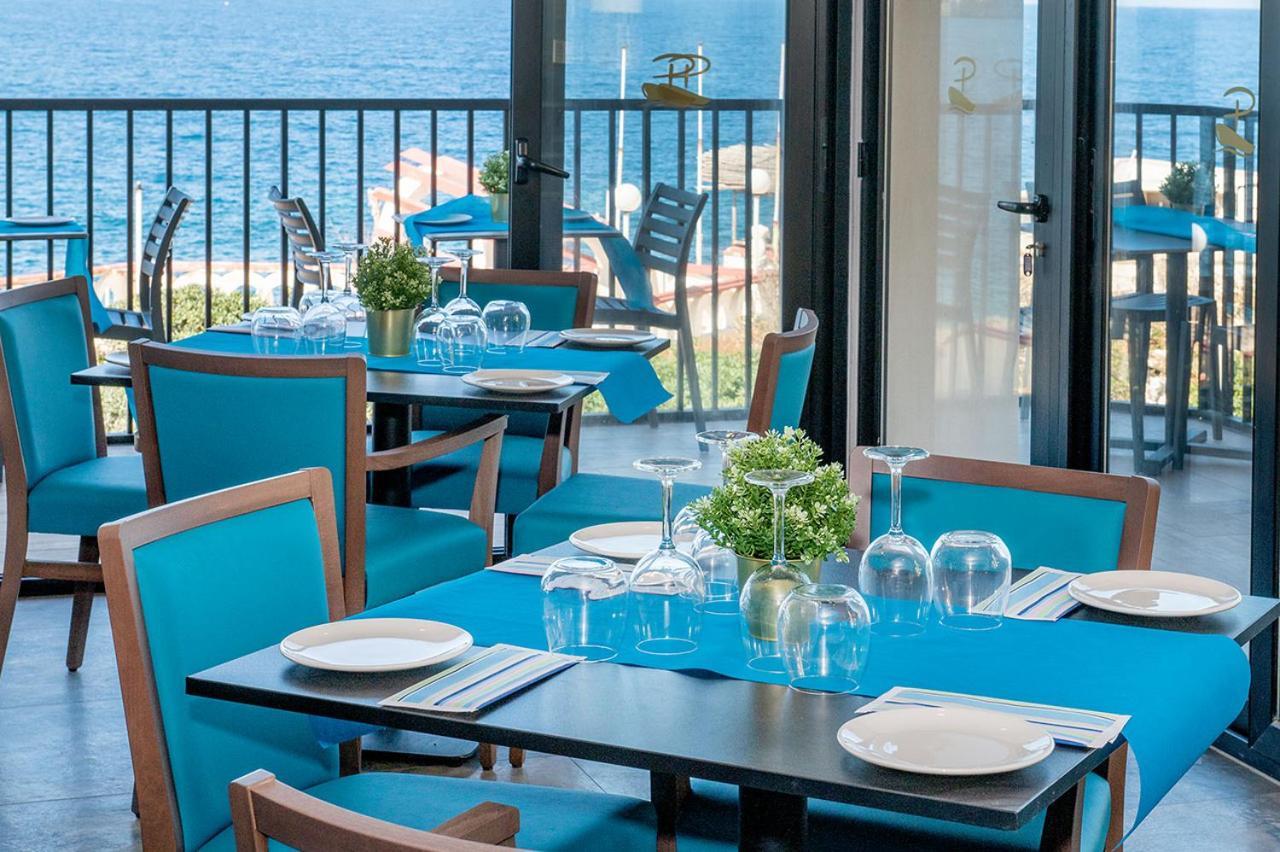 Islet Promenade Seafront Apartment With Large Corner Terrace By Getawaysmalta St. Paul's Bay Dış mekan fotoğraf